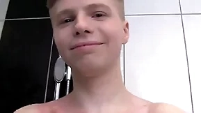 Cute soapy boy matchless surrounding a shower
